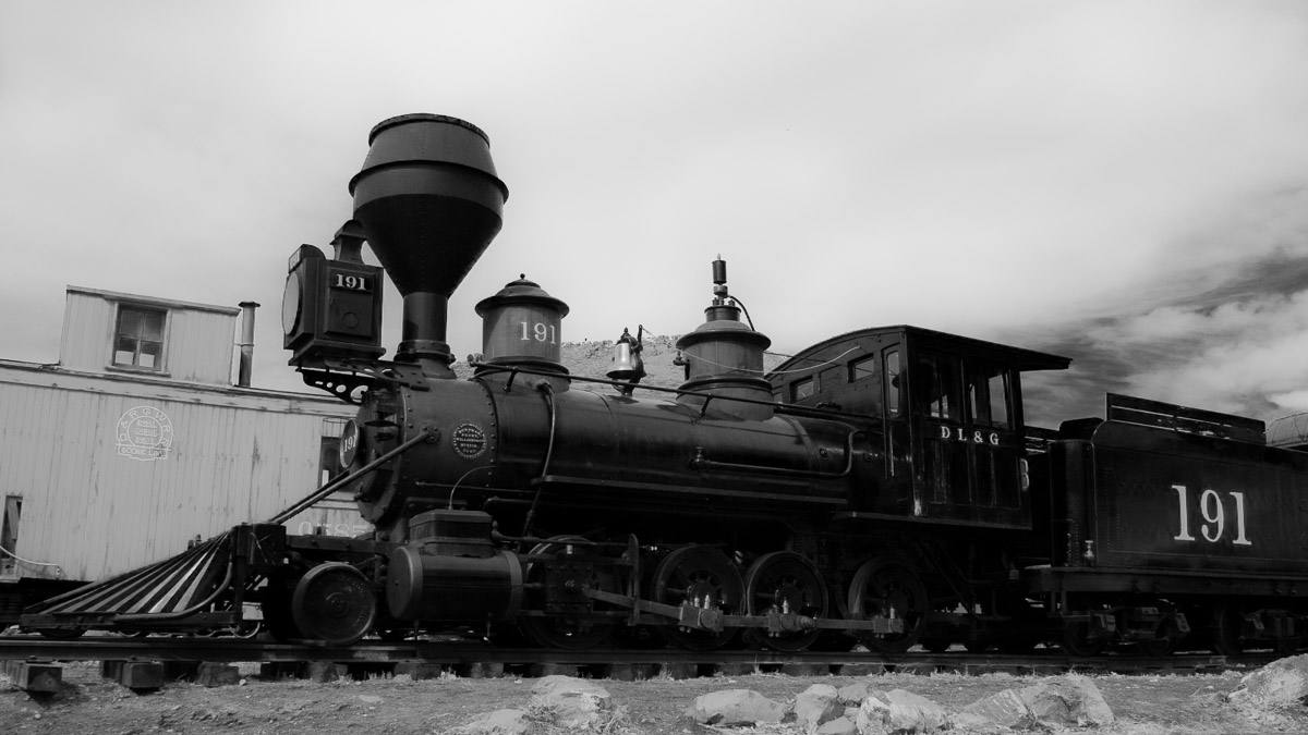 Old fashioned steam locomotive in black and white