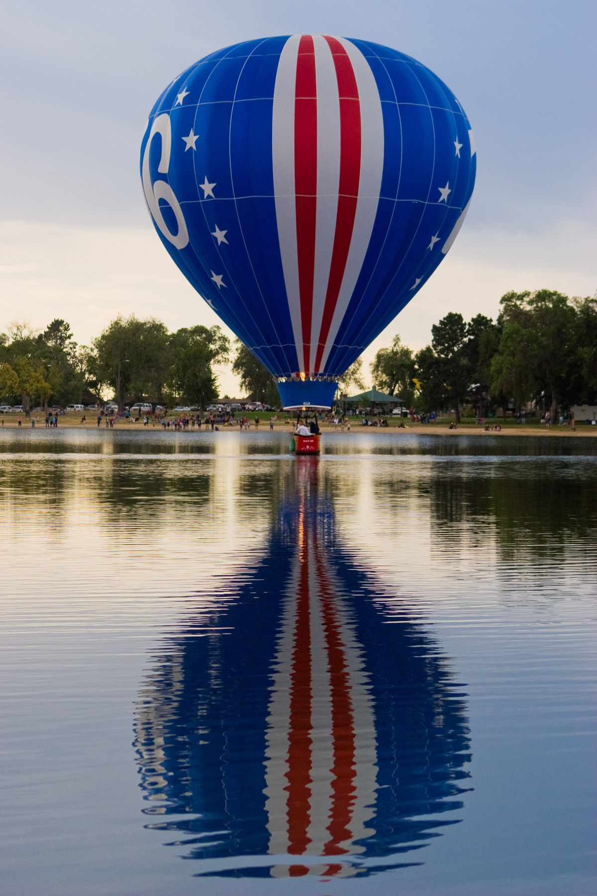 Hot air balloon over a lake